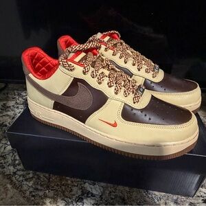 Nike Low-Top Sneakers in Cream and Brown with Red Details